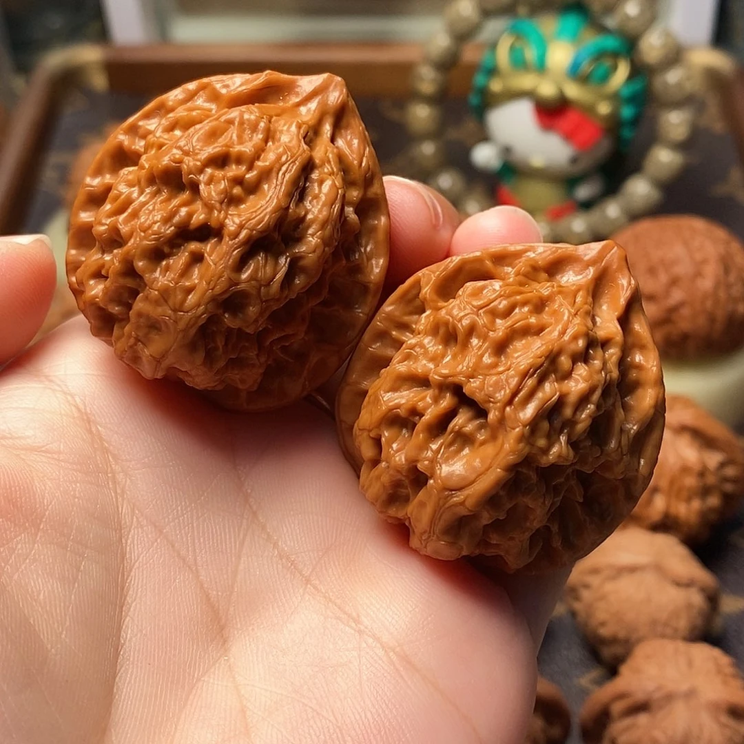 桃核把件全品梨木台38尺