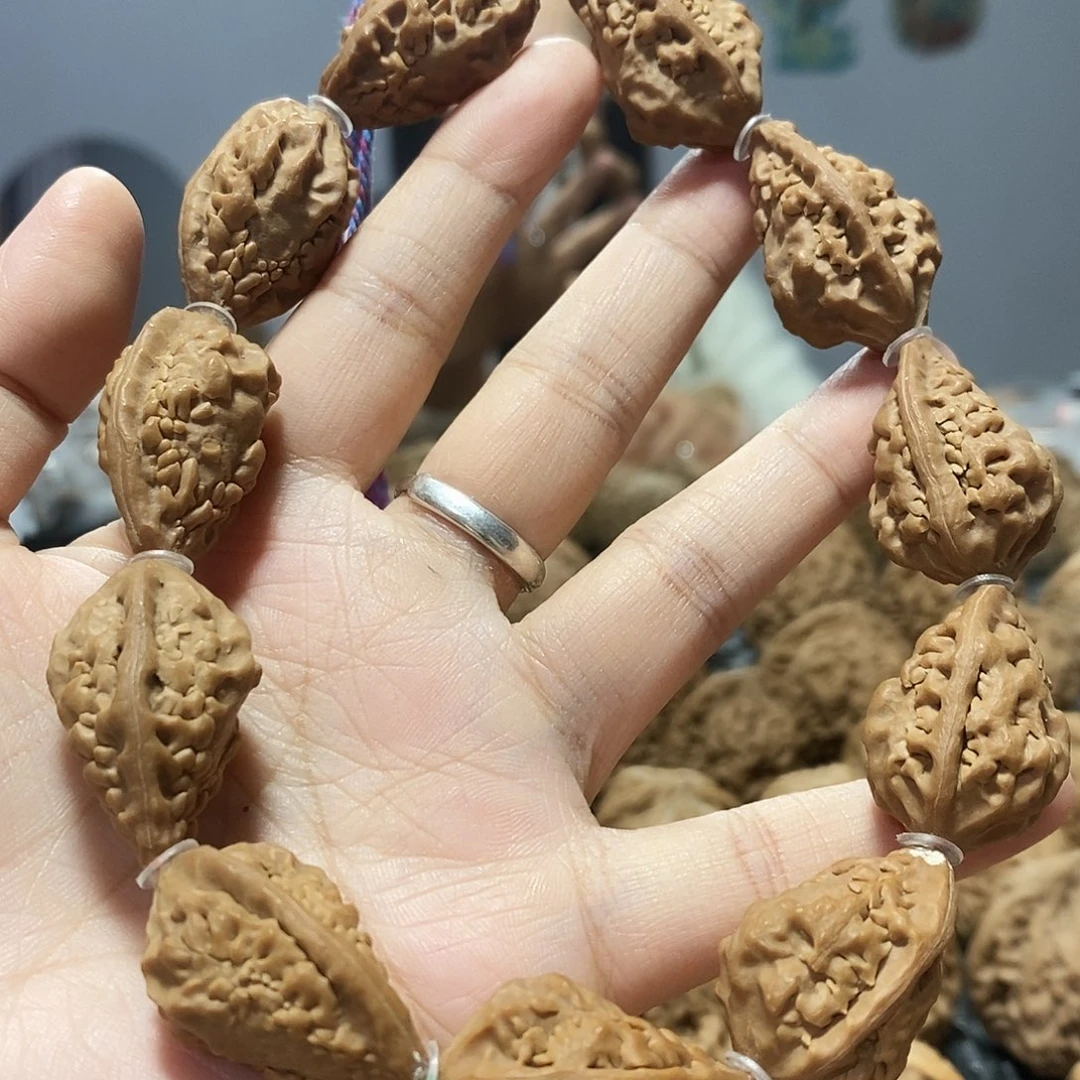 文玩核桃吊坠麒麟角