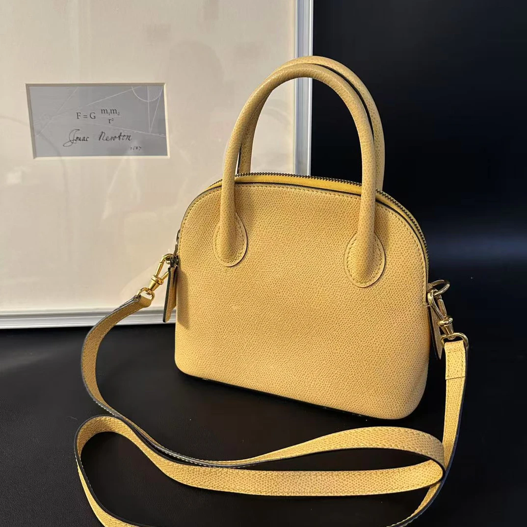 95新 Celine/思琳 九 黄色全皮手提贝壳斜挎包