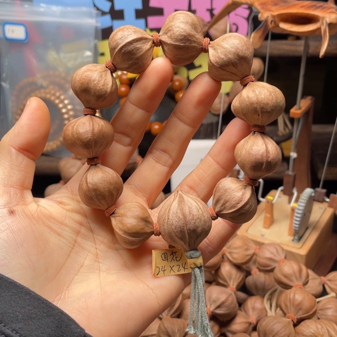 葫***爷橄榄核吊坠2424四花铁核
