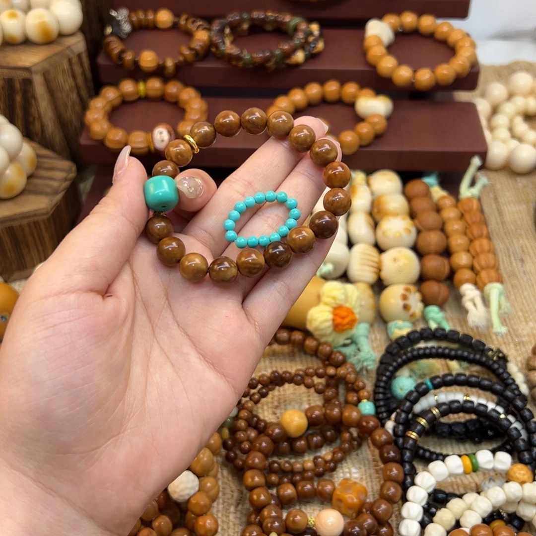 妮****库克吊坠圆珠手串