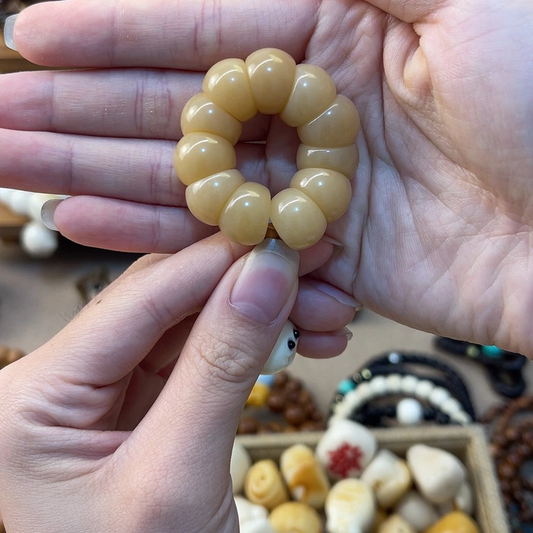 陈***西菩提根/象牙果吊坠太阳花素圈