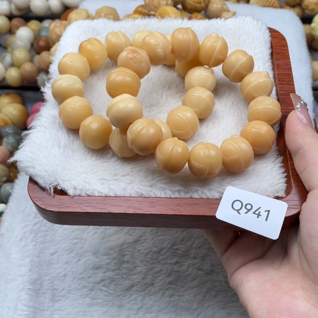 菩提根/象牙果手串瑕WQ941帽子猪16mm一串随机