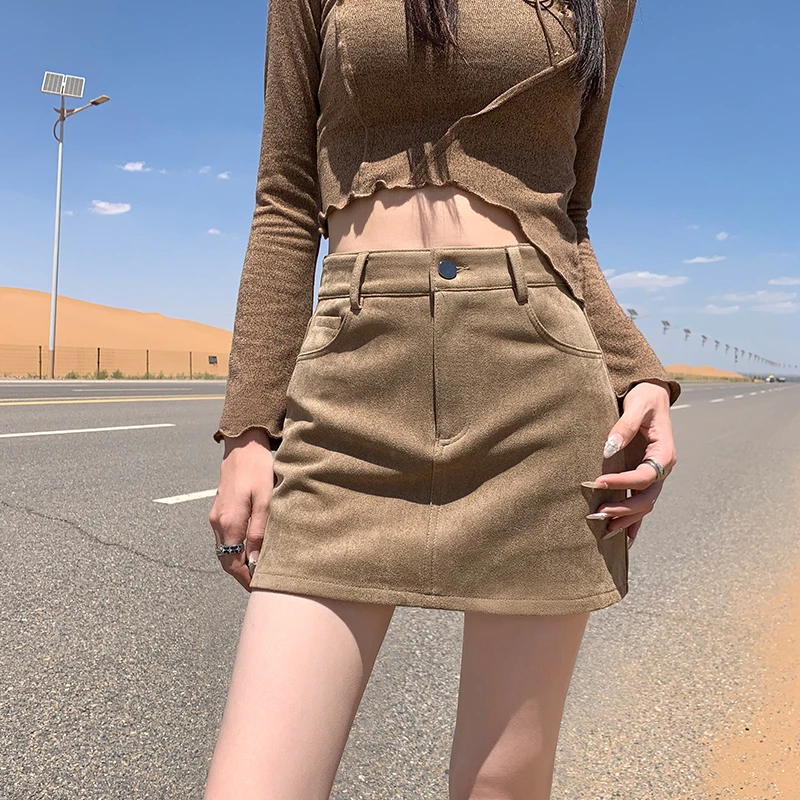 美拉德麂皮绒半身裙女2025秋冬新款高腰显瘦百搭包臀裙辣妹风短裙