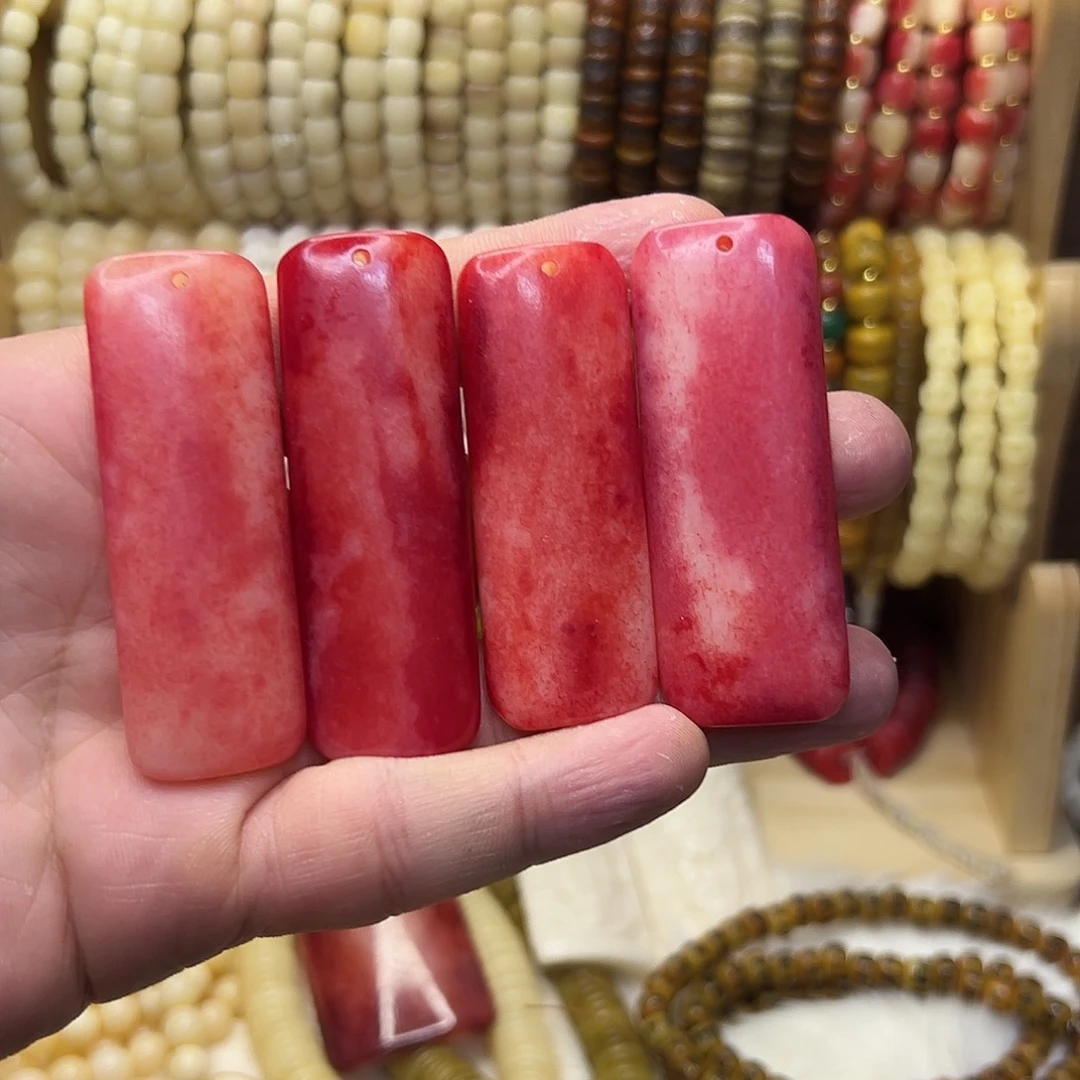 桃核把件驼骨血料无事牌