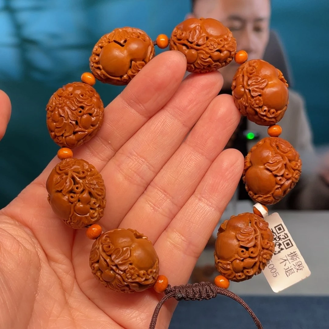 橄榄核福禄万代核雕作品