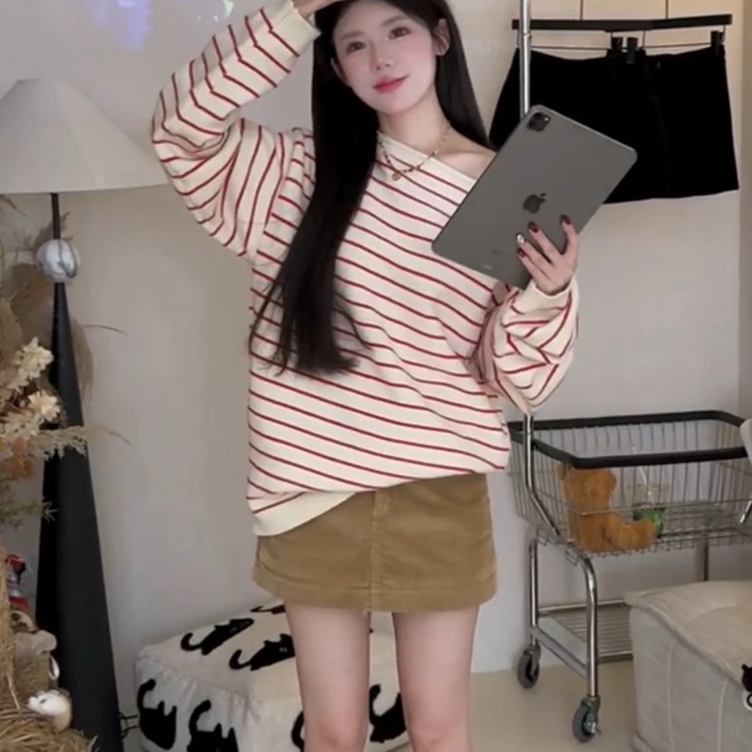 慵懒风粉色条纹斜肩气质长袖毛衣女秋冬季宽松加厚百搭针织衫上衣