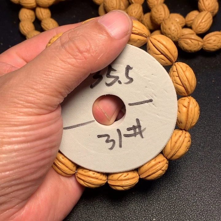 桃核手串31个健健康康了