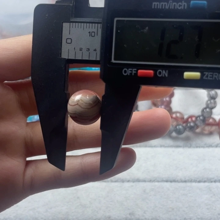 菱锰矿（红纹石）天然红纹石圆珠12mm尺寸单颗未镶嵌五花肉款