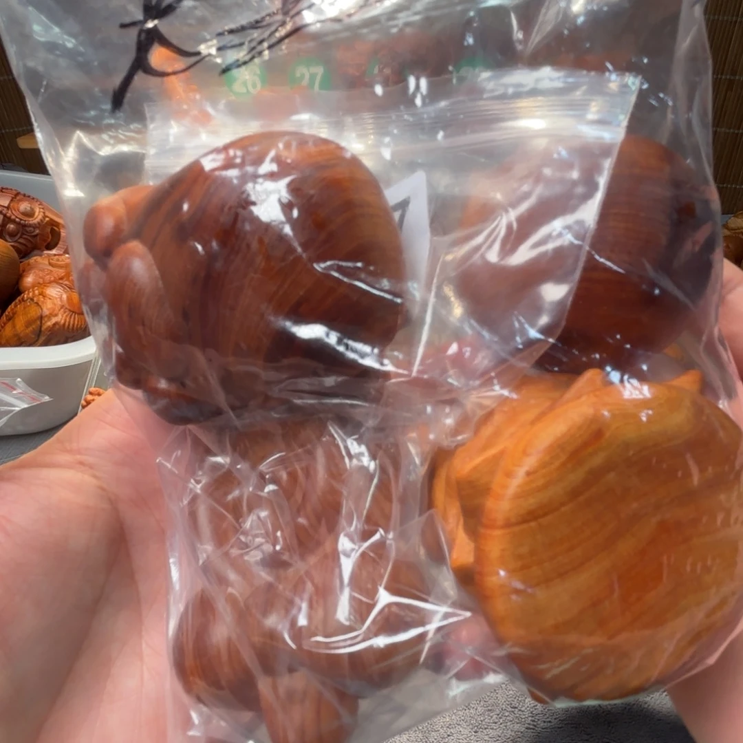 可***江崖柏崖柏陈化料手把件瑕疵处理