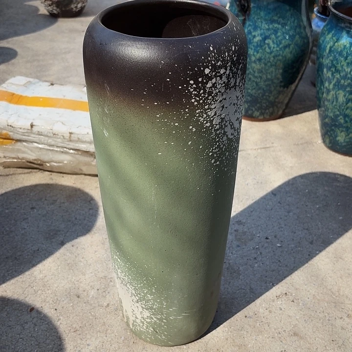 口14高44瑕疵一个盆子。