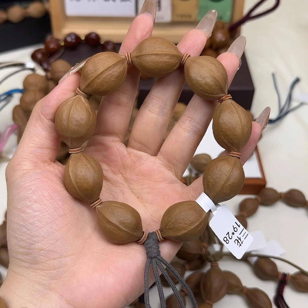 弄***来橄榄核手串/手链三花19.28