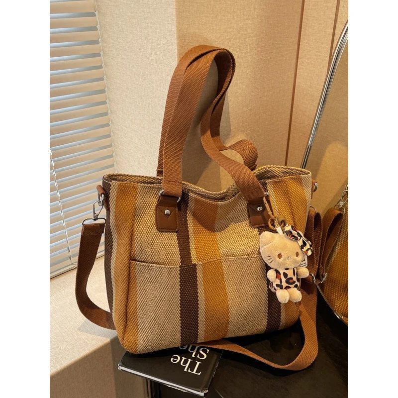 女包2025新款时尚百搭条纹帆布包大容量单肩包通勤手提托特斜挎包