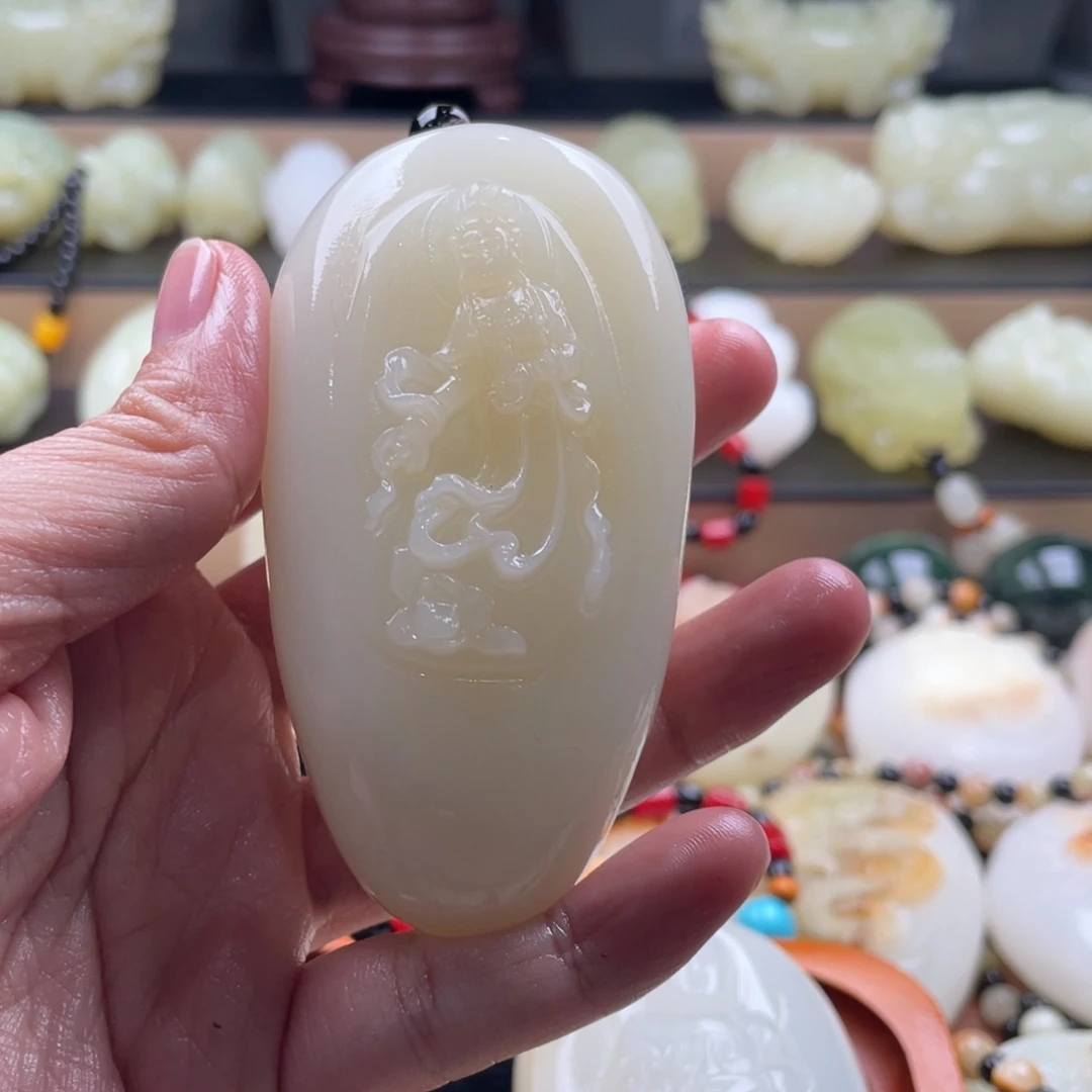 Z****石材古青石手把件