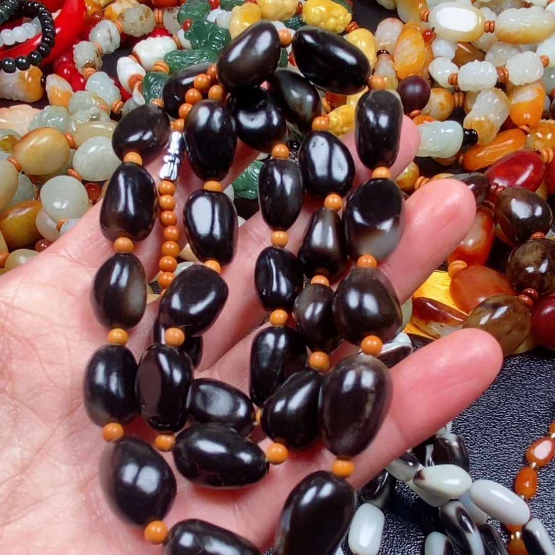 和田玉颈饰未镶嵌别****珏