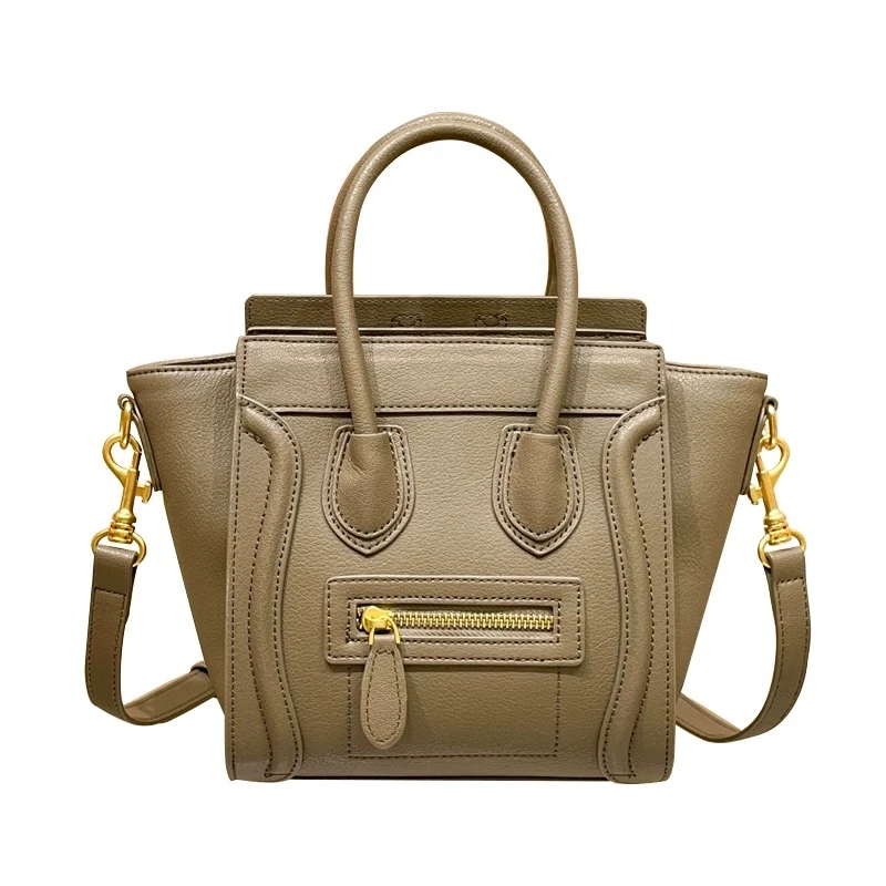 新款手提单肩斜挎包单 笑脸包