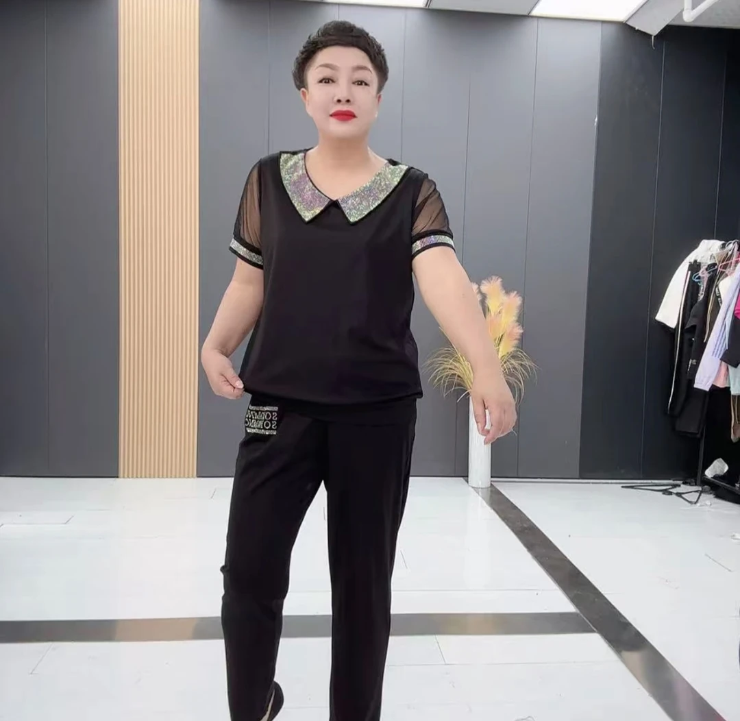 9878娃娃领时尚大码百搭洋气时尚宽松套装（上衣+裤子）