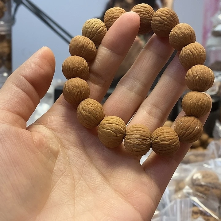 把件文玩核桃凤羽手串
