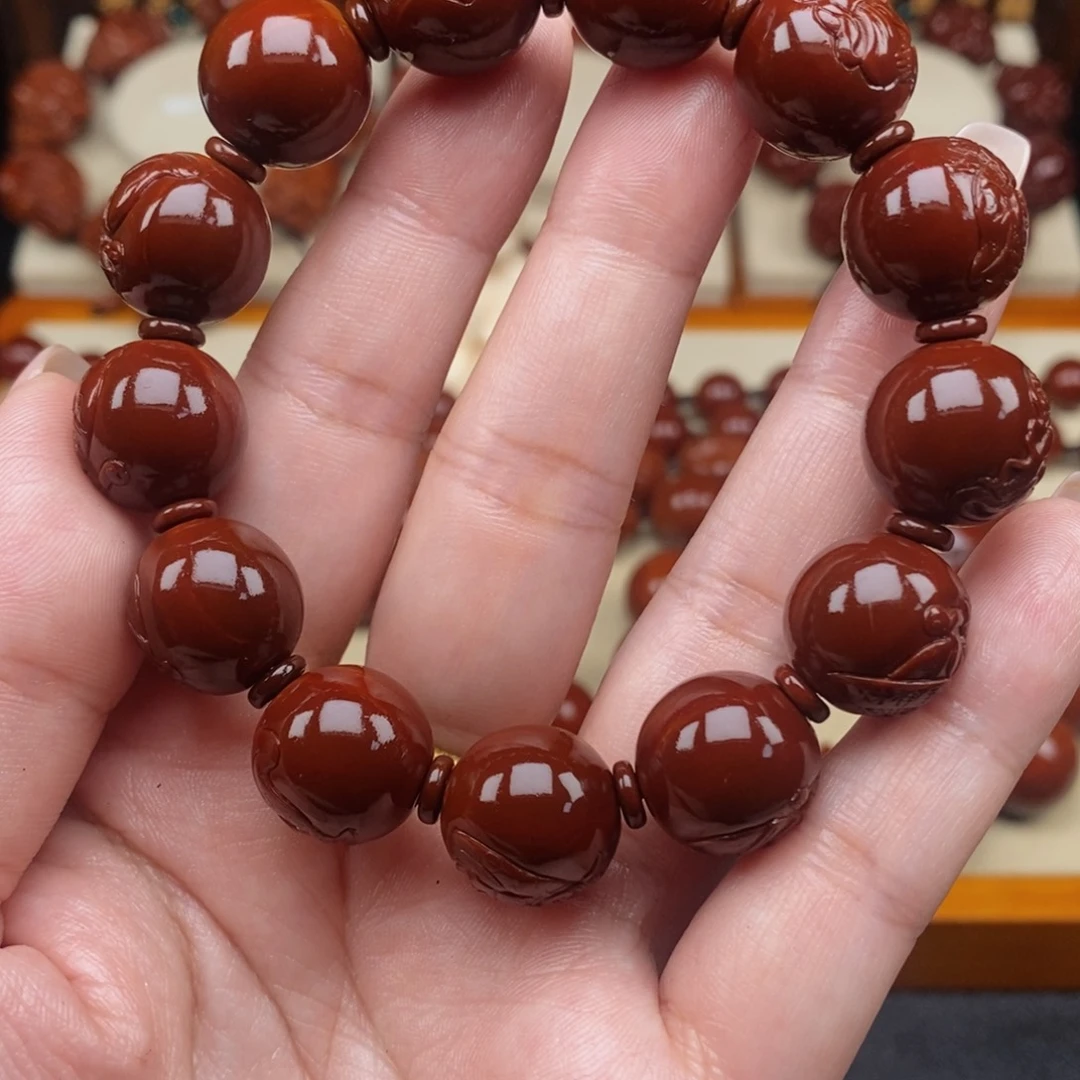 橄榄核吊坠w****j正圆财神