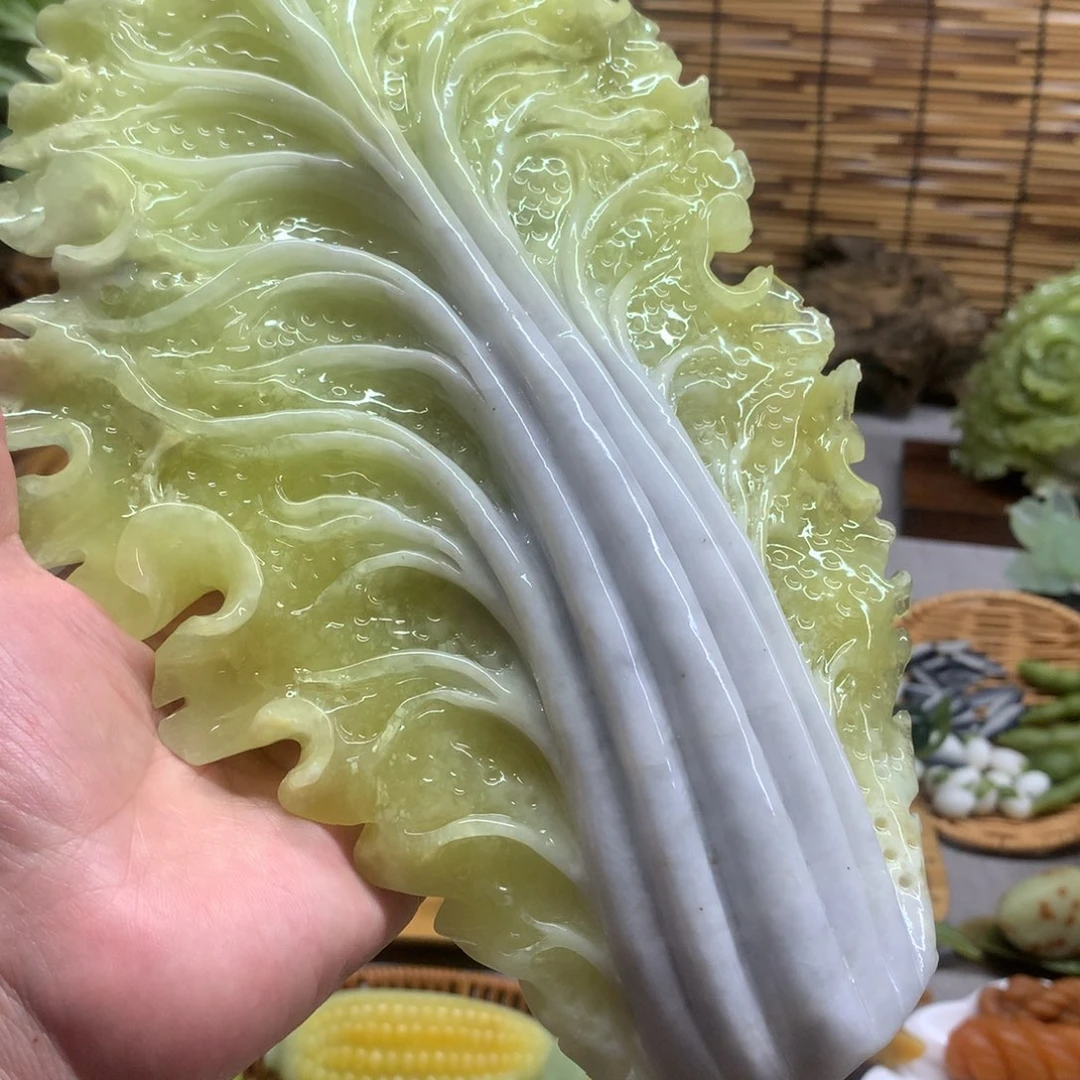 林***梦蛇纹石玉未镶嵌手把件