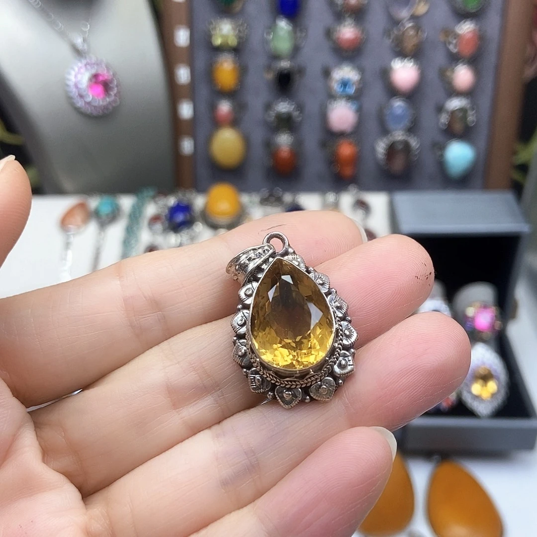 汐****琉璃925银黄色戒指
