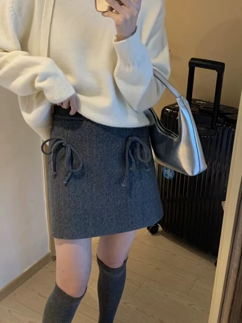 Z.X 蝴蝶结毛呢包臀半身短裙 99252（K4）