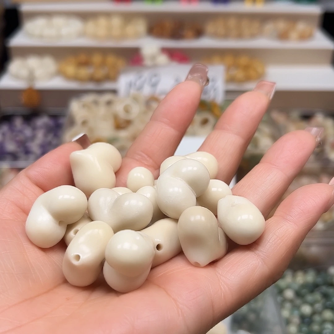 手串菩提根/象牙果瑕疵白色桃心10颗配大小有坏