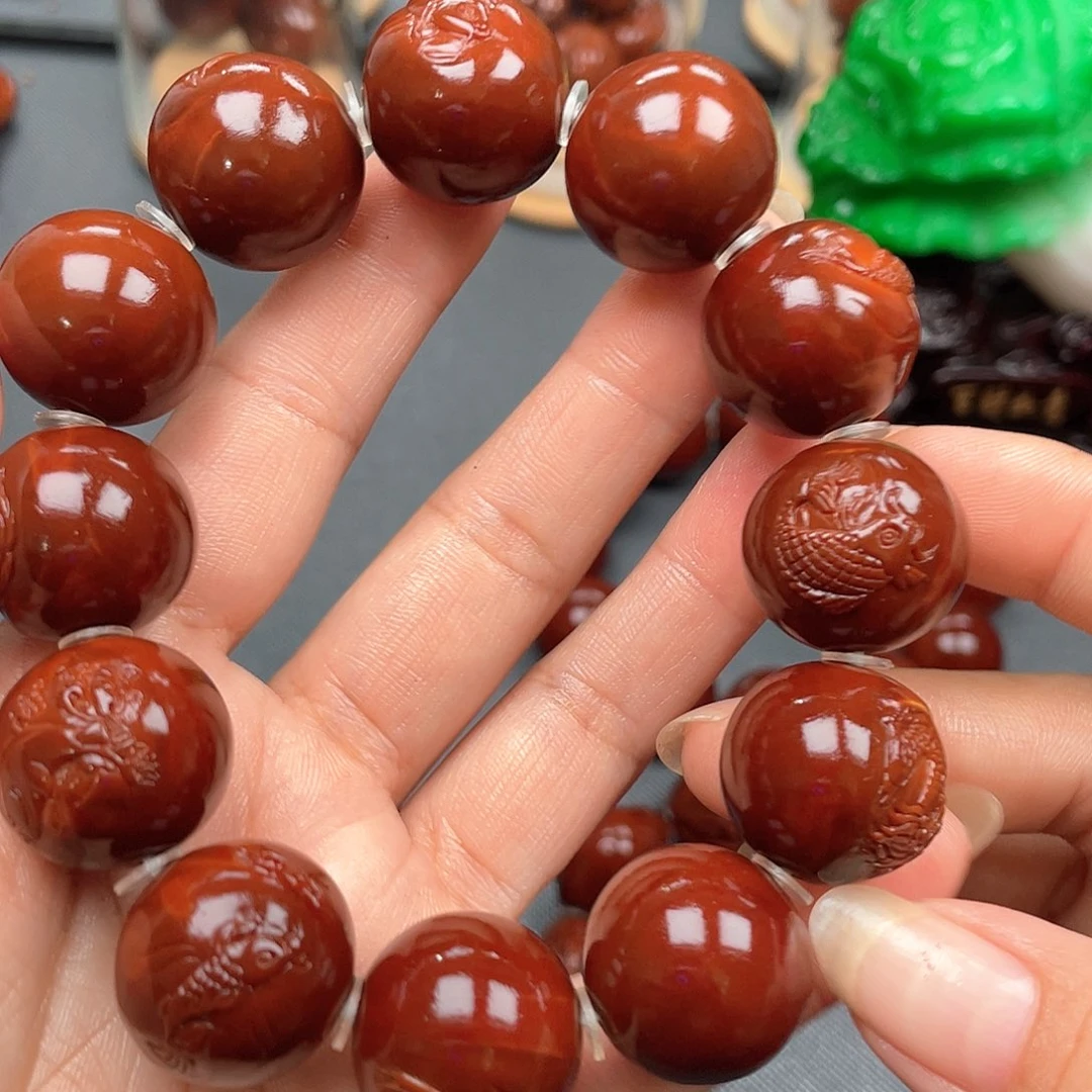 爱****手串橄榄核鱼跃龙门