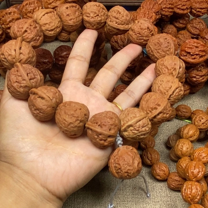 文玩核桃吊坠K****n肉桃心手持