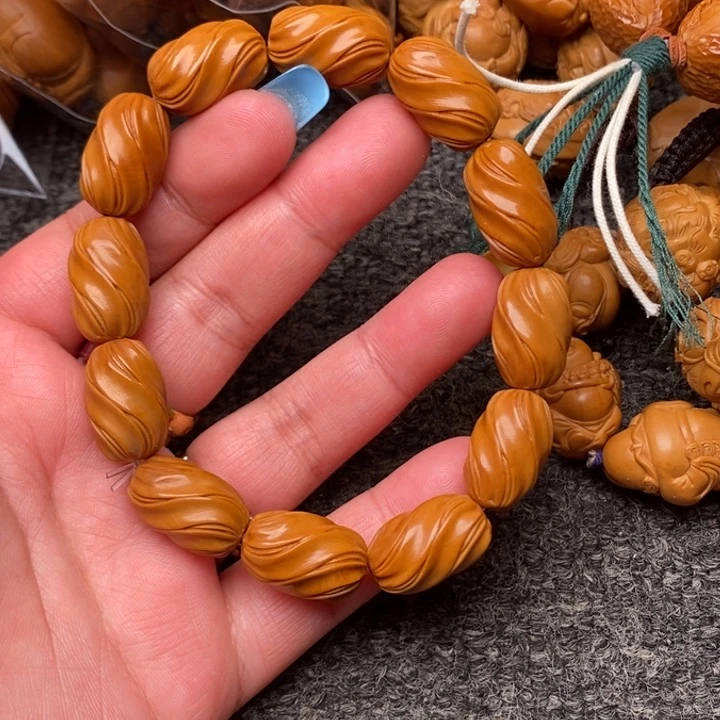 吊坠橄榄核哦啦啦啦噜啦啦啦健健康康