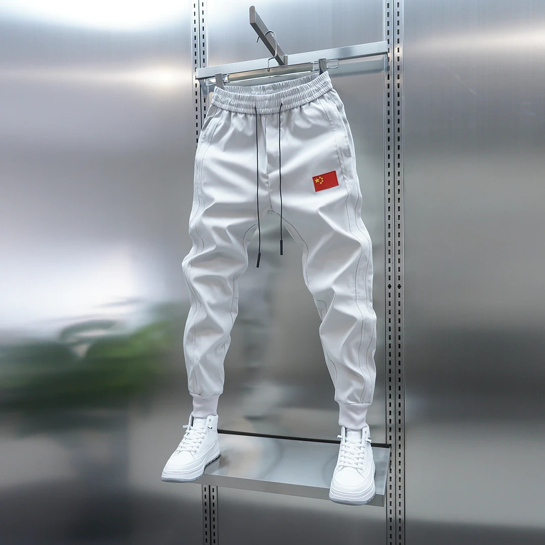 2025春季男士新款纯色休闲裤弹力松紧腰拼接刺绣束脚裤百搭小脚裤