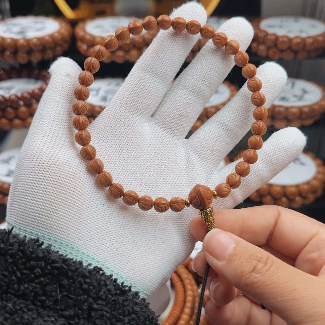 桃核吊坠龙纹桃核原皮玉龙脊手持