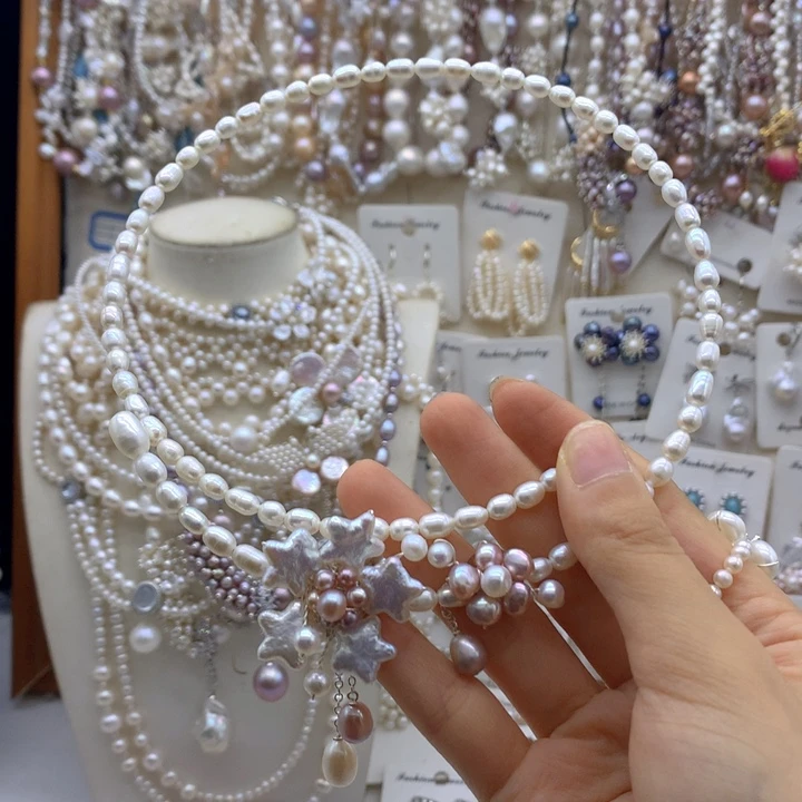 杨***子合金淡水珍珠项链耳饰