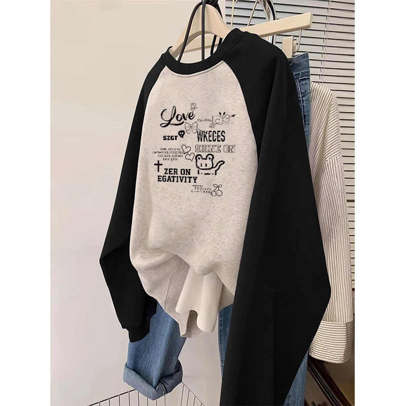 大码卫衣女秋冬2025新款撞色插肩袖设计感圆领宽松慵懒风套头上衣