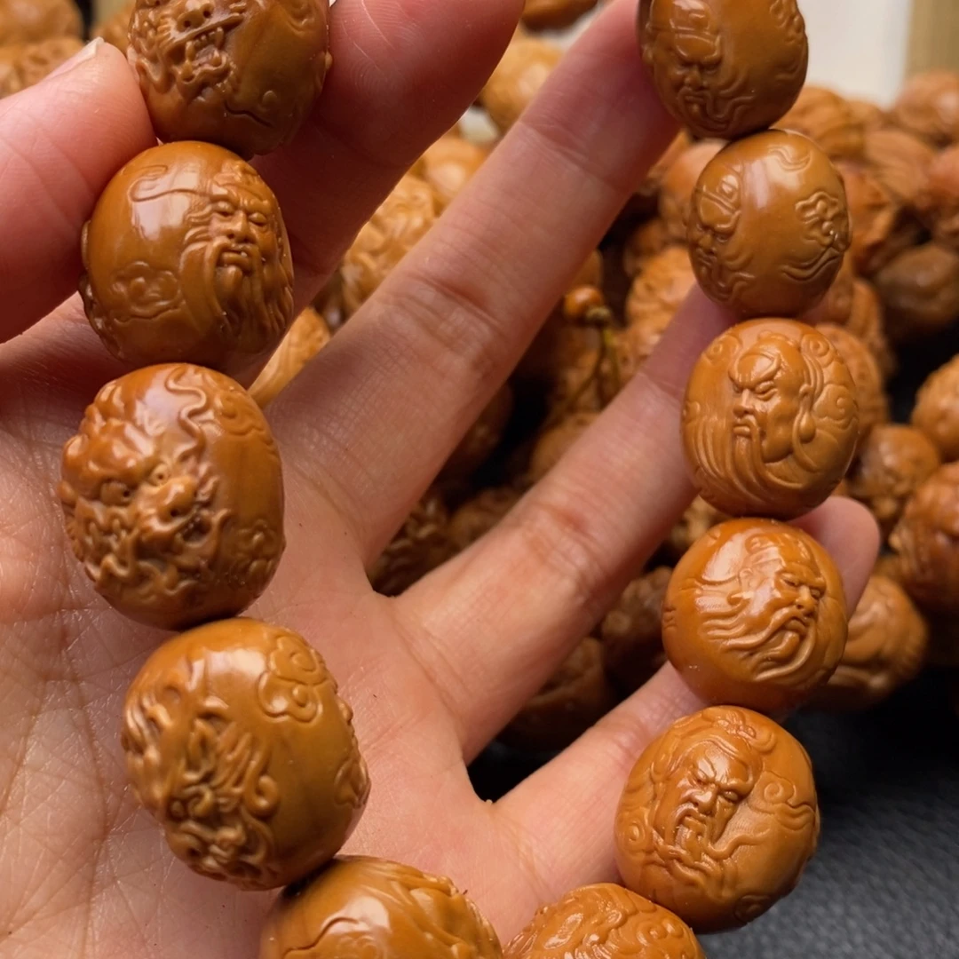 橄榄核手串龙关公