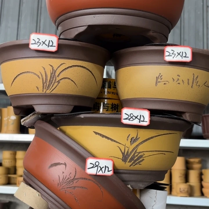 紫砂花盆100-6。