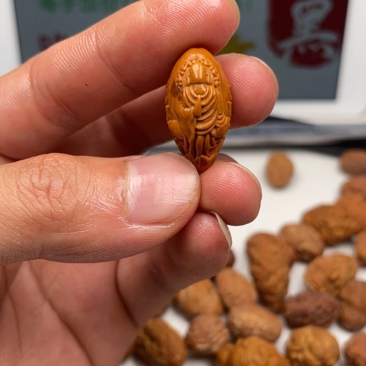 橄榄核吊坠橄榄核雕刻单子。