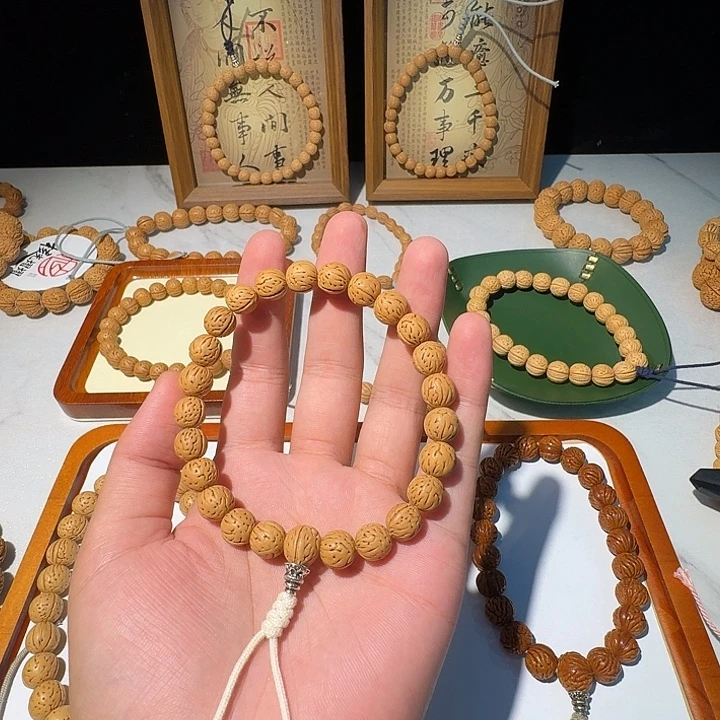 哎***嘛手串桃核野生三道筋