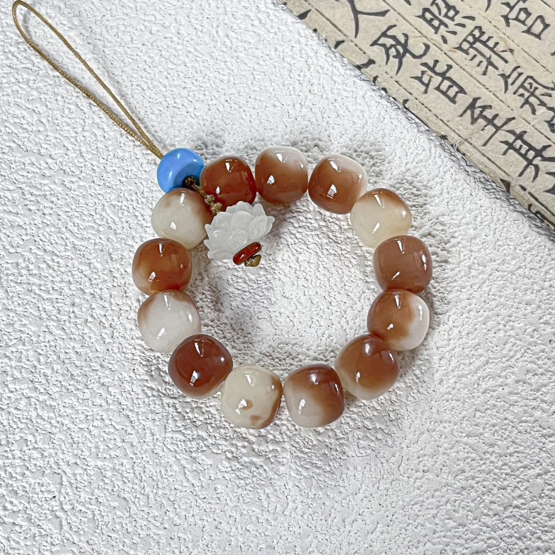 紫罗兰色的飘花老型桶司音款手机挂件11*10mm    G-B196045