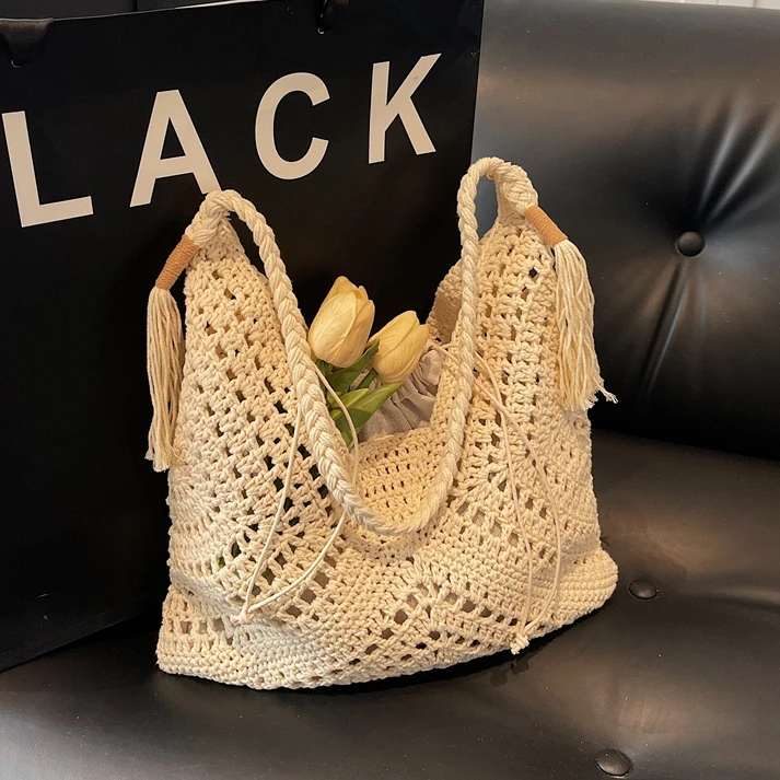 带抽绳内兜小众手工钩针镂空沙滩度假文艺风草编编织休闲手提女包