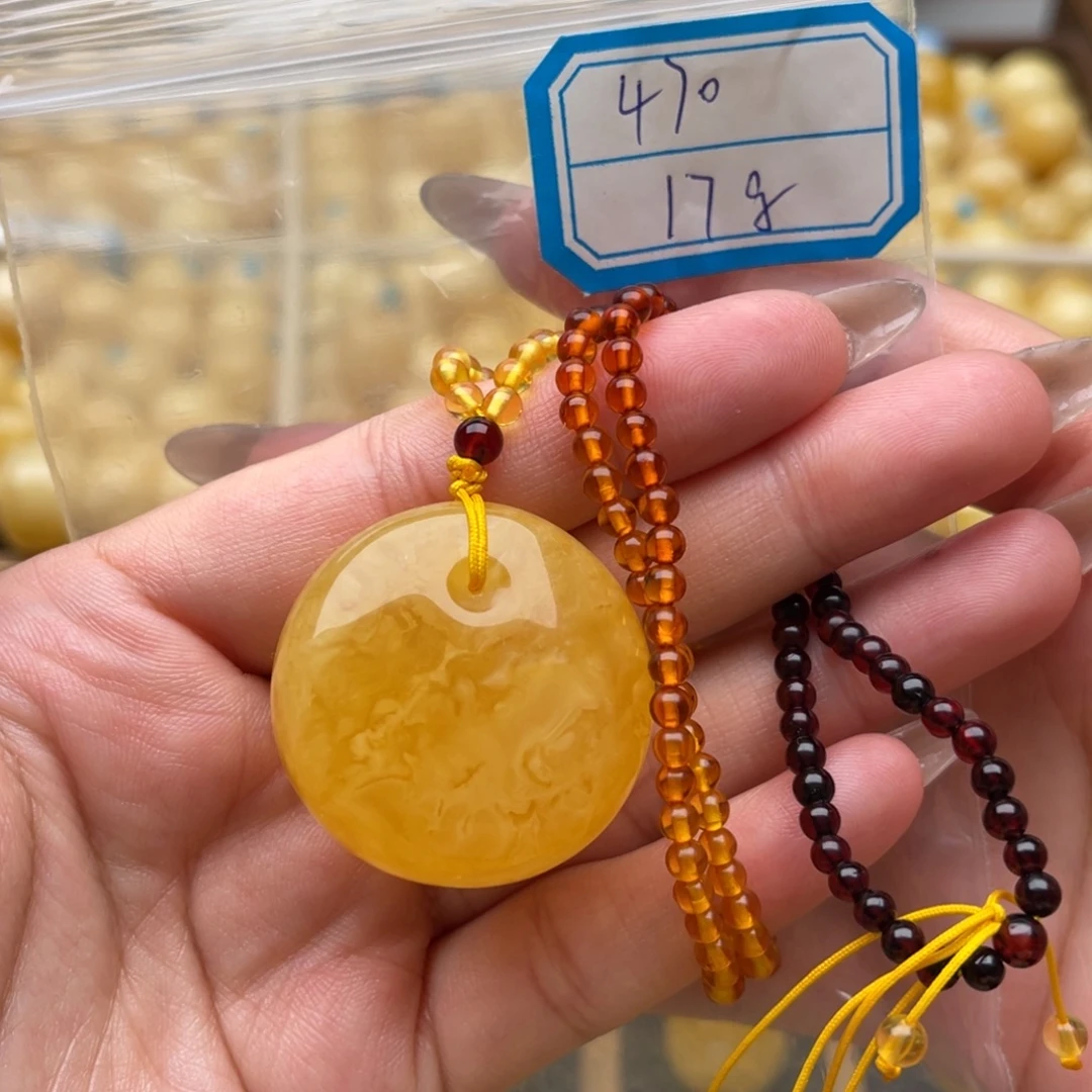 琥珀未镶嵌裸石蜜蜡吊坠笑