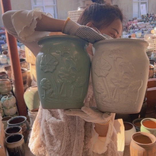 紫砂花盆高24口20。