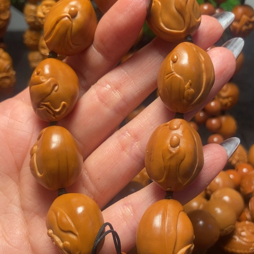 橄榄核吊坠无相佛手串