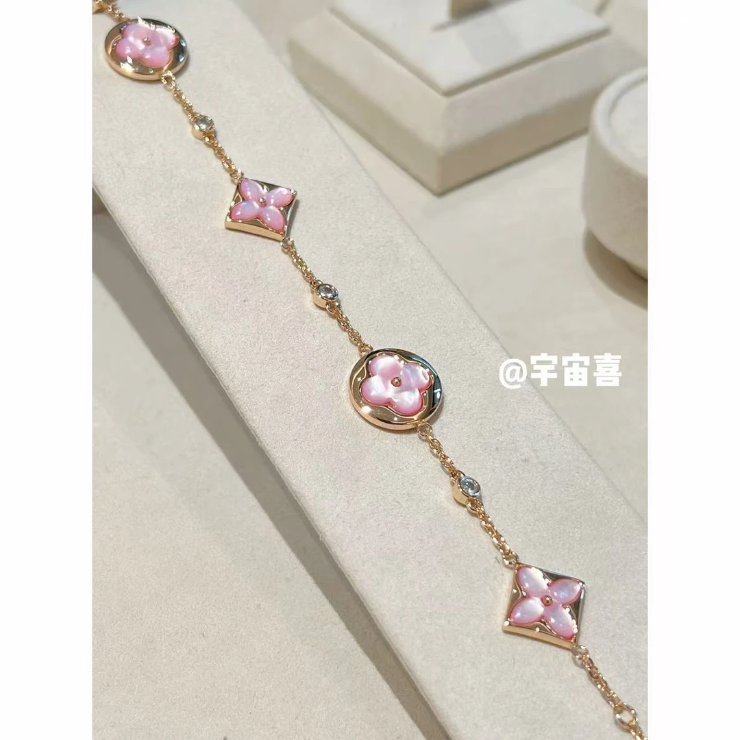 铜合金贝壳手链 F3-119【尖花圆花粉金底粉色贝壳手链】