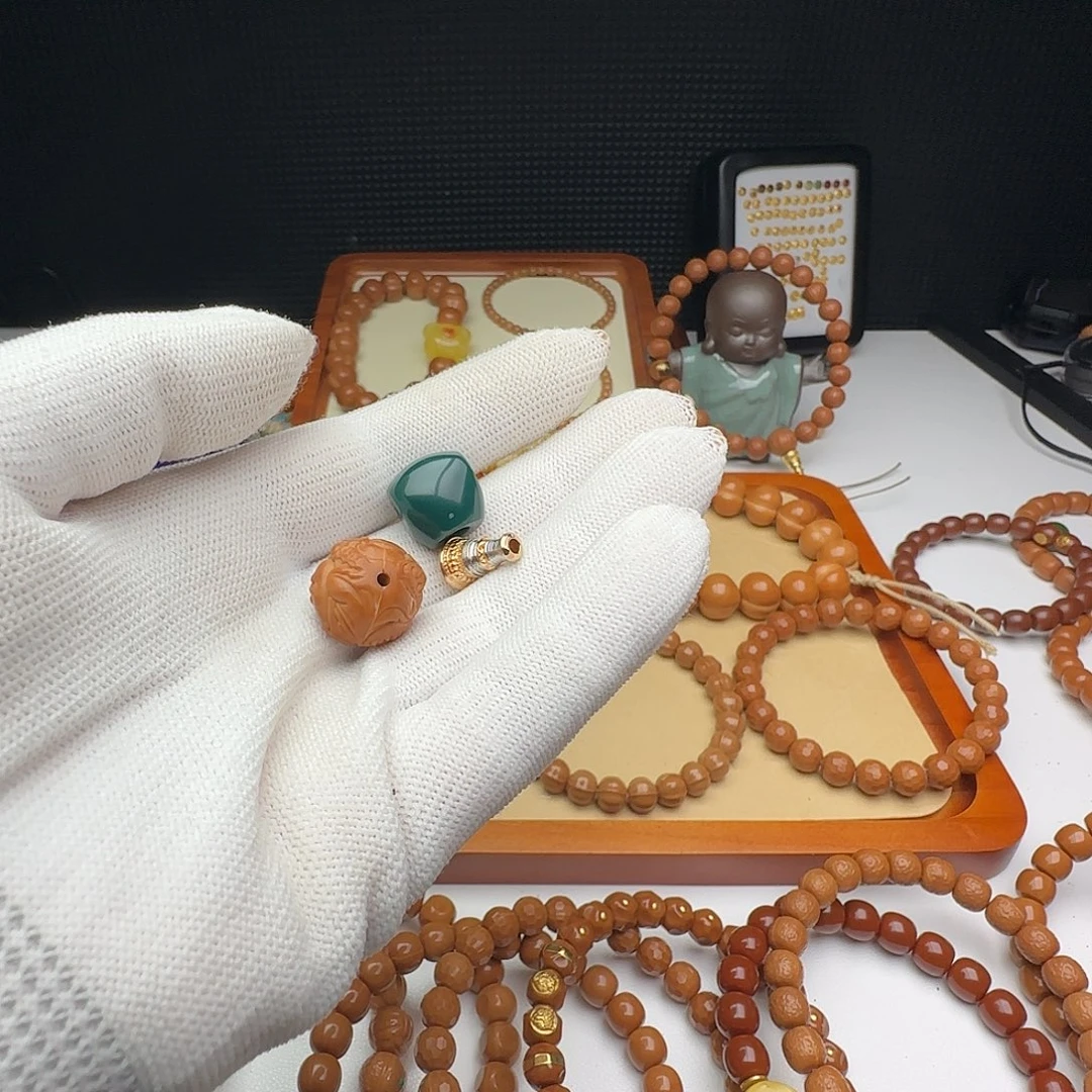 永***爱猴头核桃手串凤羽