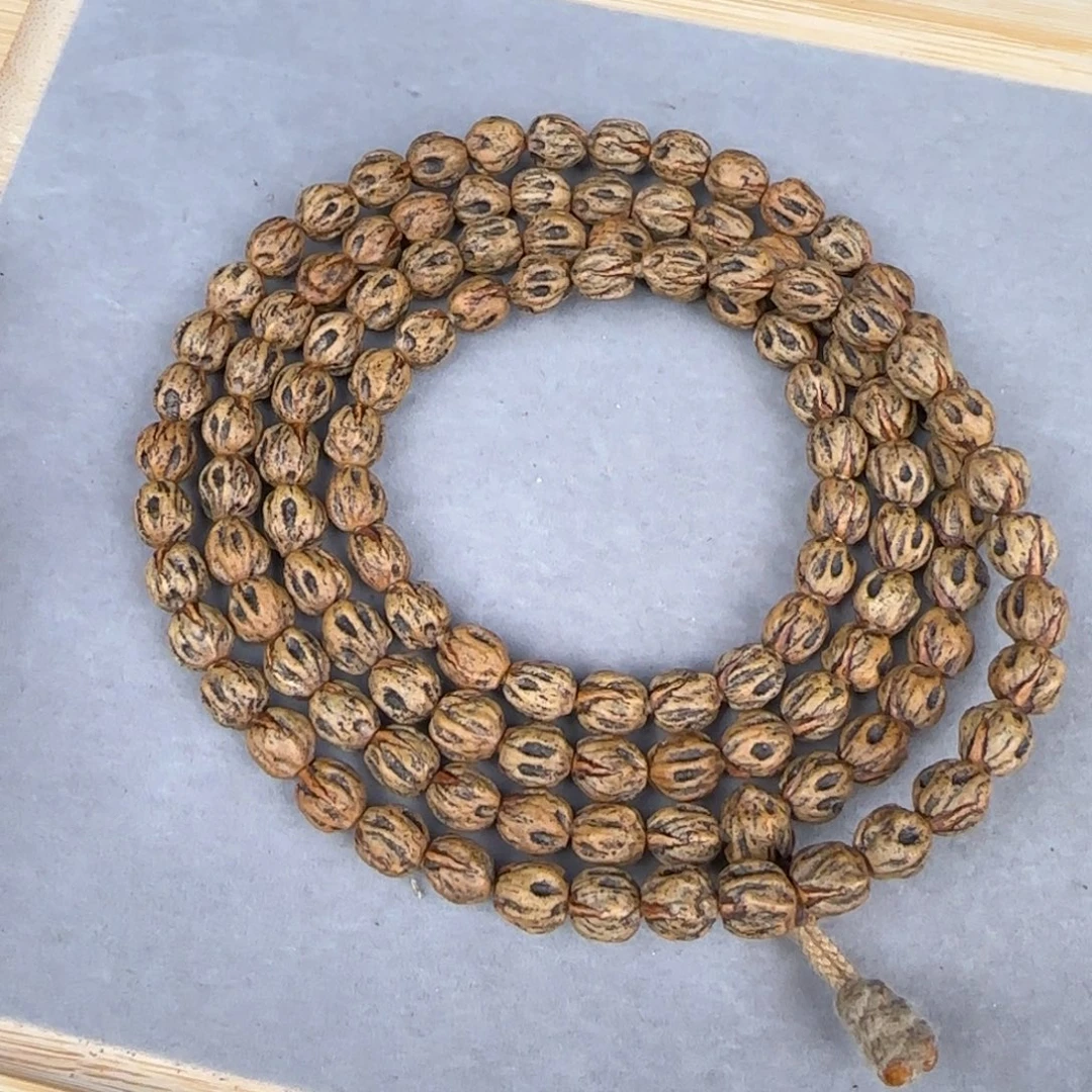 穿***牛柏香籽/百香籽吊坠