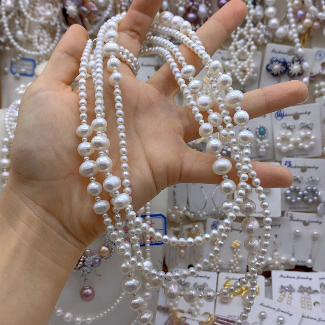梦***梦银S925镶嵌淡水珍珠项链耳饰