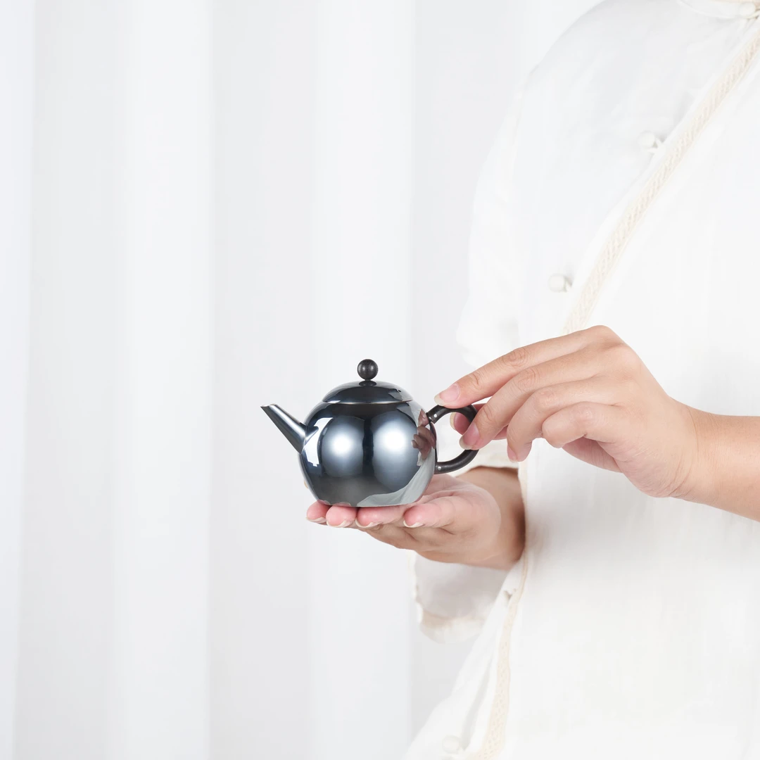 炮口文旦球形足银泡茶壶