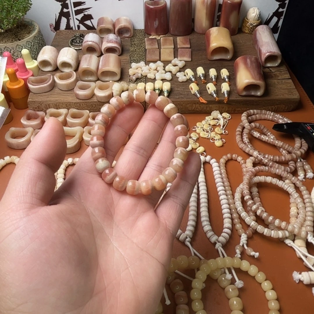 驼骨手串/手链?驼骨三花粉串