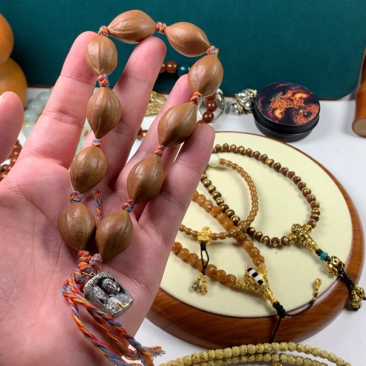 【闪购商品】橄榄核吊坠。。。。。。。。。。。。。